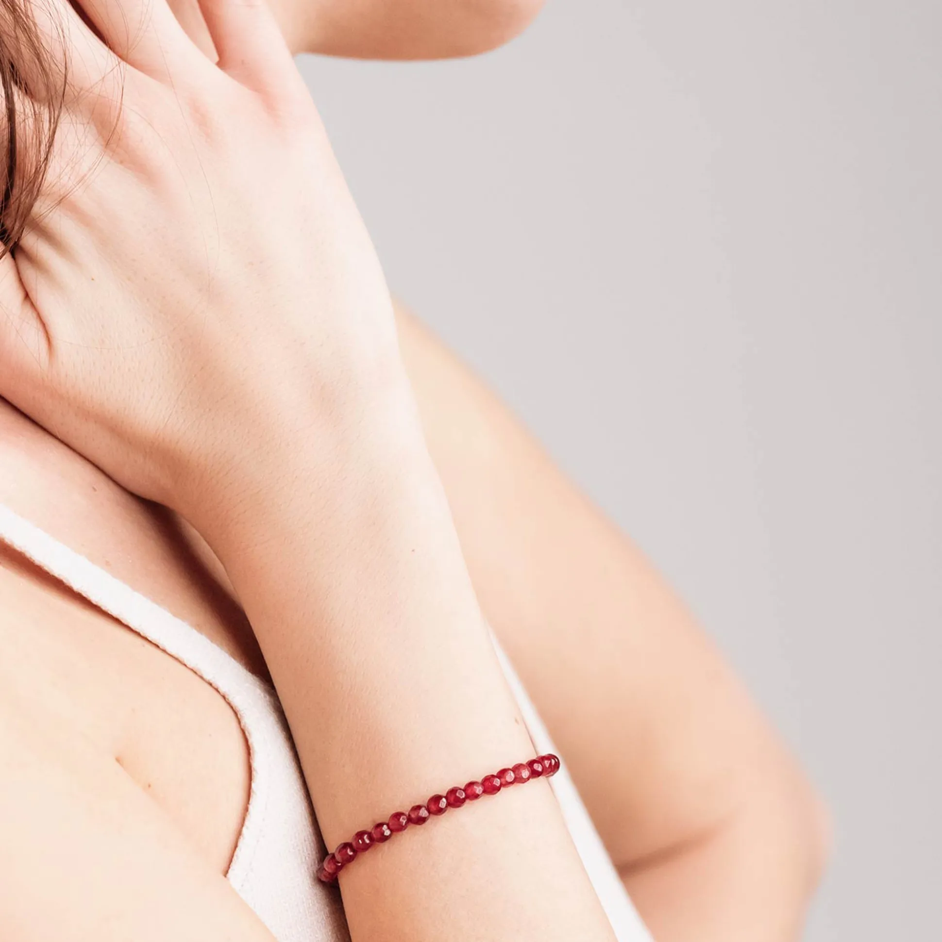 KALEIDO-IP GOLD STEEL BRACELET WITH RED AGATE
